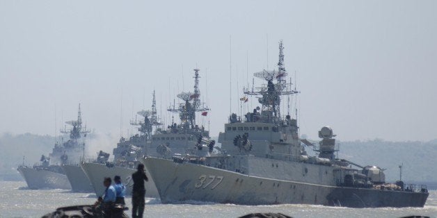 SURABAYA, INDONESIA - SEPTEMBER 25: Indonesia warships perform Sailing Pass during the preparation for the anniversary of Indonesia Military or Tentara Nasional Indonesia (TNI) at Indonesian Navy Eastern Fleet on September 25, 2014 in Surabaya, East Java, Indonesia. TNI anniversary on October 5, 2014 will be held with a massive festive and with all the strength of the main tools of weapons systems of the Indonesia Navy, Indonesia Army and Indonesia Air Force. (Photo by Alex Widojo/Anadolu Agency/Getty Images)