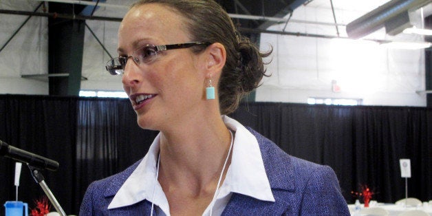 Amanda Curtis speaks before the opening of the Montana Democratic Party's special nominating convention in Helena, Montana, Saturday, Aug. 16, 2014. Curtis, a legislator from Butte, is one of the candidates seeking the party's nomination to replace Sen. John Walsh in the Senate race against Republican U.S. Rep. Steve Daines. (AP Photo/Matt Volz)