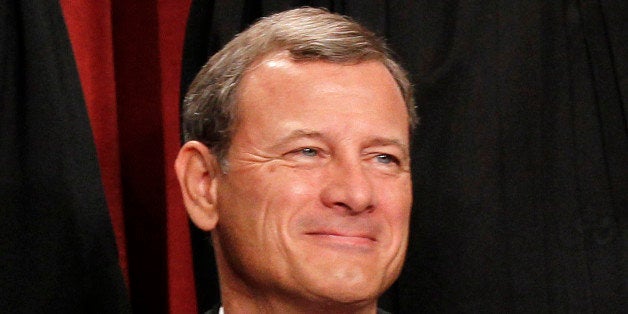 FILE - In this Oct. 8, 2010 file photo, Chief Justice John G. Roberts is seen during the group portrait at the Supreme Court