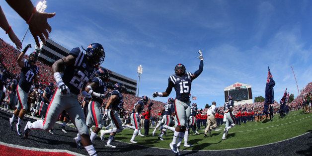 OXFORD, MS - OCTOBER 4: The Ole Miss Rebels take the field before a game against the Alabama Crimson Tide on October 4, 2014 at Vaught-Hemingway Stadium in Oxford, Mississippi. Mississippi beat Alabama 23-17. (Photo by Joe Murphy/Getty Images)