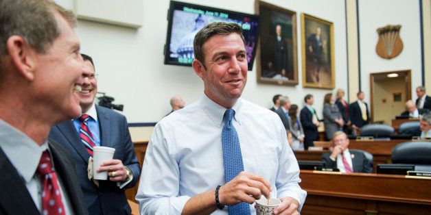 UNITED STATES - JUNE 11: Rep. Duncan Hunter, R-Calif., talks with attendees of a House Armed Services Committee hearing in Rayburn Building on the Sgt. Bowe Bergdahl prisoner exchange, June 11, 2014. Secretary of Defense Chuck Hagel, testified.(Photo By Tom Williams/CQ Roll Call)