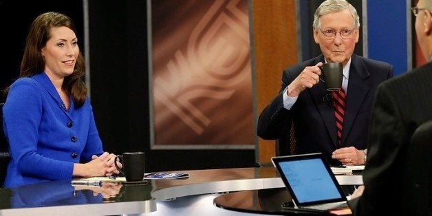 LEXINGTON, KY - OCTOBER 13: Minority Leader U.S. Sen. Mitch McConnell (R) and Kentucky Secretary of State Alison Lundergan Grimes (D) prepare with host Bill Goodman before their debate on 'Kentucky Tonight' at the KET Network Center on October 13, 2014 in Lexington, Kentucky. Voters go to the polls on November 4, 2014. (Photo by Pablo Alcala-Pool/Getty Images)