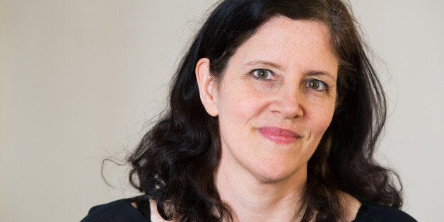 Laura Poitras poses for a portrait on Wednesday, April 16, 2014 in New York. (Photo by Charles Sykes/Invision/AP)