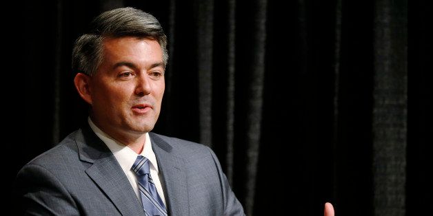 Republican challenger U.S. Rep. Cory Gardner makes point during senatorial debate with incumbent U.S. Sen. Mark Udall, D-Colo., at The Denver Post in Denver on Tuesday, Oct. 7, 2014. (AP Photo/David Zalubowski)