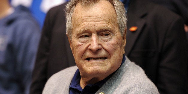 DURHAM, NC - JANUARY 18: Former U.S. President George H.W. Bush looks on during a game between the North Carolina State Wolfp