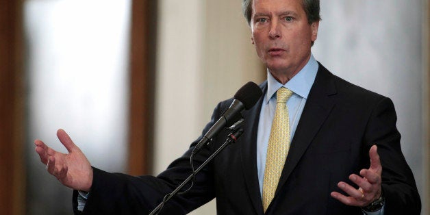 AUSTIN, TX - JULY 01: Lt. Gov. David Dewhurst in the Senate at the Texas State capitol on July 1, 2013 in Austin, Texas. This is first day of a second legislative special session called by Texas Gov. Rick Perry to pass an restrictive abortion law through the Texas legislature. The first attempt was defeated after opponents of the law were able to stall the vote until after first special session had ended. (Photo by Erich Schlegel/Getty Images)