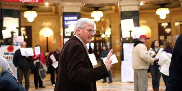MADISON, WI - MARCH 04: Republican Wisconsin State Senator Glenn Grothman waves as he walks through the Wisconsin State Capitol on March 4, 2011 in Madison,Wisconsin. Some demonstrators have returned to the capitol building hours after they were forced to vacate the building after occupying it for more than two weeks to protest Governor Scott Walker's attempt to push through a bill that would restrict collective bargaining for most government workers in the state. (Photo by Justin Sullivan/Getty Images)