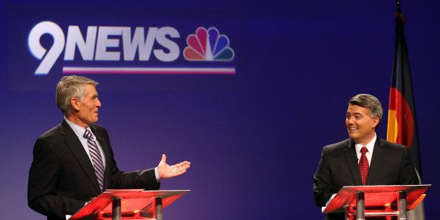 Incumbent U.S. Sen. Mark Udall, D-Colo., left, faces off with with his opponent U.S. Rep. Cory Gardner, R-Colo., during a televised debate at 9News in Denver, Wednesday Oct. 15, 2014. Colorado's U.S. Senate candidates met for their final televised debate before election day on Nov. 4. (AP Photo/Brennan Linsley)