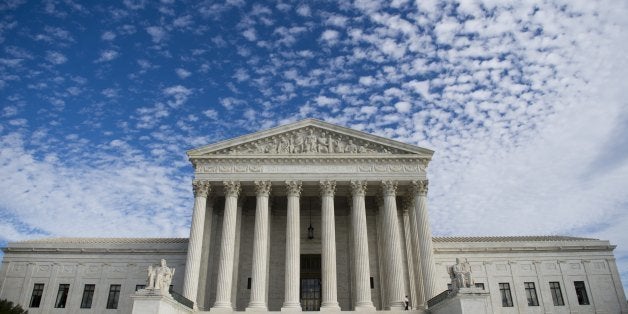 The US Supreme Court in Washington, DC, November 6, 2013. Earlier the Court heard oral arguments in the case of Town of Greece v. Galloway dealing with whether holding a prayer prior to the monthly public meetings in the New York town of Greece violates the Constitution by endorsing a single faith. AFP PHOTO / Saul LOEB (Photo credit should read SAUL LOEB/AFP/Getty Images)