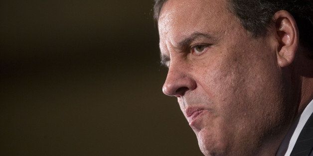 Chris Christie, governor of New Jersey, pauses while speaking during a Legal Reform Summit at the U.S. Chamber of Commerce in Washington, D.C., U.S., on Tuesday, Oct. 21, 2014. Christie, the New Jersey governor who seems a likely addition to the 2016 presidential primary roster, has been traveling the country doing what he's supposed to do as chairman of the Republican Governors Association: raising as much money and publicity as he can to help his party's incumbents and candidates ahead of the Nov. 4 elections. Photographer: Andrew Harrer/Bloomberg via Getty Images 