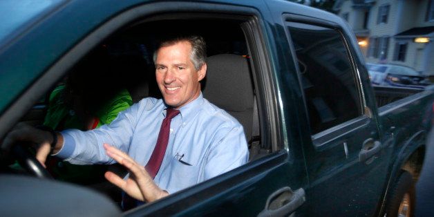 FILE - In this Oct. 23, 2014 file photo, New Hampshire Republican Senate candidate, former Massachusetts Sen. Scott Brown arrives in his pickup truck for a live televised Senate debate with Democratic Sen. Jeanne Shaheen, D-N.H., in Concord, N.H. Their majority in jeopardy, Senate Democrats unleashed a late-campaign round of attack ads Monday accusing Republicans in key races of harboring plans to cut Social Security and Medicare. (AP Photo/Jim Cole, File)
