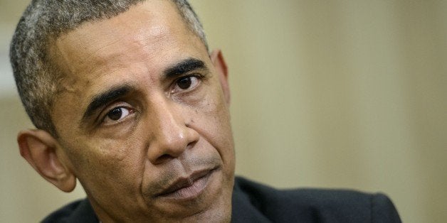 US President Barack Obama makes a statement to the press on the Canadian Parliament shooting after their meeting in the Oval Office of the White House October 22, 2014 in Washington, DC. AFP PHOTO/Brendan SMIALOWSKI (Photo credit should read BRENDAN SMIALOWSKI/AFP/Getty Images)