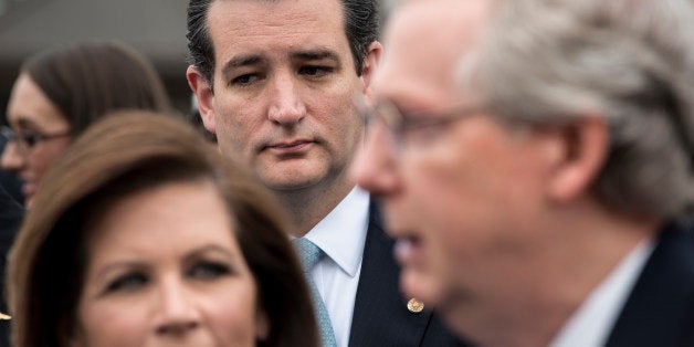 L-R: Rep. Michele Bachmann,R-MN, Senator Ted Cruz ,R-TX, listen while Senate Minority Leader Senator Mitch McConnell ,R-KY, s