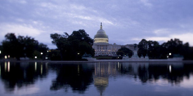 The U.S. Capitol Building stands in this photo taken with a tilt-shift lens in Washington, D.C., U.S., on Friday, Oct. 3, 2014. When Congress returns to Washington on Nov. 12, lawmakers' to-do list will include a longer-term government funding measure and legislation setting Defense Department policy. Photographer: Andrew Harrer/Bloomberg via Getty Images