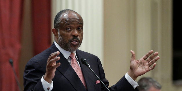 FILE - In this Sept. 9, 2013, file photo, state Sen. Roderick Wright, D-Inglewood, speaks at the Capitol in Sacramento, Calif. Wright, who was convicted on eight counts of perjury and voter fraud by a Los Angeles County Superior Court jury, is expected to be sentenced Wednesday, Sept. 3, 2014. (AP Photo/Rich Pedroncelli, File)