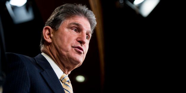 UNITED STATES - FEBRUARY 6: Sen. Joe Manchin, D-W.Va., speaks during a news conference to discuss the introduction of a resolution that would require congressional approval for any military mission in Afghanistan after 2014, on Thursday, Feb. 6, 2014. (Photo By Bill Clark/CQ Roll Call)