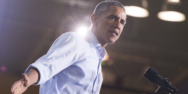 US President Barack Obama speaks at a Democratic campaign rally for US Senate candidate Gary Peters and candidate for Michiga