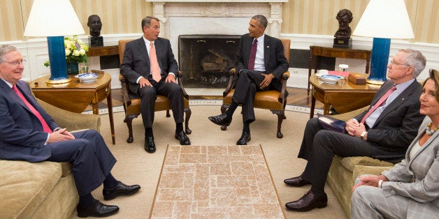 President Barack Obama meets with Congressional leaders in the Oval Office of the White House in Washington, Tuesday, Sept. 9, 2014, to discuss options for combating the Islamic State. From left are, Senate Minority Leader Mitch McConnell of Ky., House Speaker John Boehner of Ohio, the president, Senate Majority Leader Harry Reid of Nev., and House Minority Leader Nancy Pelosi of Calif. (AP Photo/Evan Vucci)