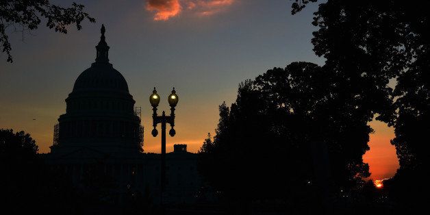 WASHINGTON, DC - AUGUST 13: The United States Capitol is seen the sun sets on Wednesday August 13, 2014 in Washington, DC. On August 24, 1814 the British burned the U.S. Capitol and the White House among other buildings. (Photo by Matt McClain/ The Washington Post via Getty Images)
