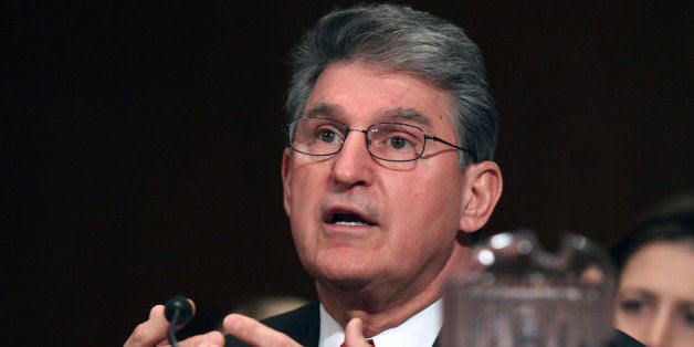 Sen. Joe Manchin, D-W.Va. testifies on Capitol Hill in Washington, Tuesday, Feb. 4, 2014, before the Senate subcommittee on Water and Wildlife hearing to examine the safety and security of drinking water supplies following the Central West Virginia drinking water crisis. (AP Photo/Lauren Victoria Burke)