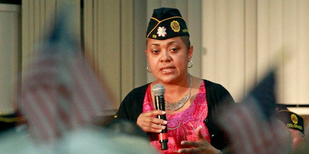 Veterans Affairs Rehabilitation Director Verna Jones speaks during a town hall meeting at American Legion Post 1 on Monday, June 9, 2014, in Phoenix concerning health-care issues at the Phoenix VA facilities. One Veterans Affairs Department health care system in Arizona has been flagged for further review following a nationwide audit of the agency's troubled appointment process, according to a report released Monday. (AP Photo/Ralph Freso)