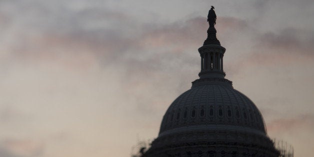 The U.S. Capitol Building stands in this photo taken with a tilt-shift lens in Washington, D.C., U.S., on Friday, Oct. 3, 2014. When Congress returns to Washington on Nov. 12, lawmakers' to-do list will include a longer-term government funding measure and legislation setting Defense Department policy. Photographer: Andrew Harrer/Bloomberg via Getty Images