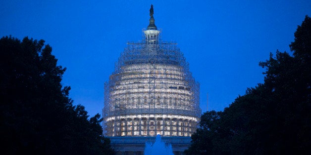 Scaffolding surrounds the U.S. Capitol Building while it undergoes repairs in Washington, D.C., U.S., on Wednesday, Nov. 5, 2