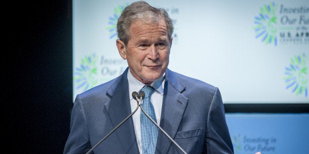 WASHINGTON, DC - AUGUST 6: Former U.S. President George W. Bush speaks at a Spousal Symposium at the John F. Kennedy Center for the Performing Arts on August 6, 2014 in Washington, DC. The symposium, sponsored by first lady Michelle Obama and former first lady Laura Bush, focuses on the role the spouses of world leader's play and the impact of investments in education, health, and economic development through public-private partnerships. (Photo by Pete Marovich/Getty Images)