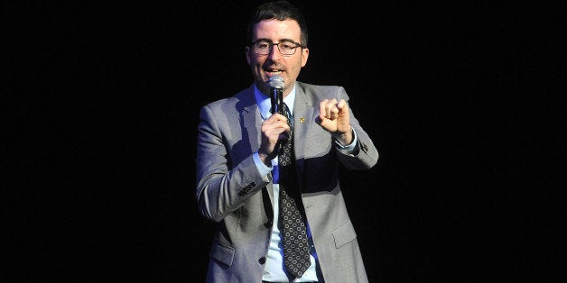 John Oliver performs at the 8th Annual Stand Up For Heroes, presented by the New York Comedy Festival and The Bob Woodruff Foundation, at the Theater at Madison Square Garden on Wednesday, Nov. 5, 2014, in New York. (Photo by Brad Barket/Invision/AP)