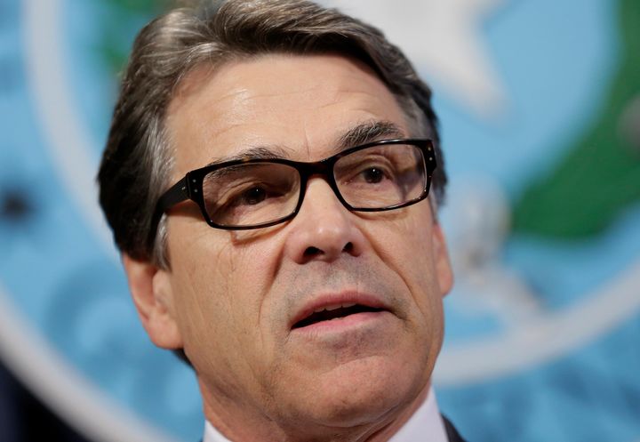 Texas Gov. Rick Perry answers questions during a news conference to discuss Texasâ Ebola prevention efforts, Friday, Oct. 17, 2014, in Austin, Texas. Perry has joined calls for an air travel ban from countries hit the hardest by Ebola. (AP Photo/Eric Gay)