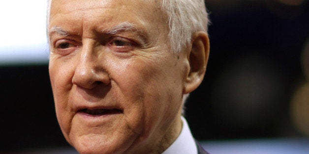 FILE - In this Aug. 27, 2012 file photo, Sen. Orrin Hatch, R-Utah, ranking Republican on the Senate Finance Committee, talks to reporters on the floor of the Republican National Convention in Tampa, Fla. A temporary reduction in Social Security payroll taxes is due to expire at the end of the year and hardly anyone in Washington is pushing to extend it. Neither Obama nor Romney has proposed an extension, and it probably wouldnât get through Congress anyway, with lawmakers in both parties down on the idea. (AP Photo/David Goldman, File)