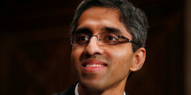 FILE - In this Feb. 4, 2014, photo, Dr. Vivek Hallegere Murthy, President Barack Obama's nominee to be the next U.S. Surgeon General, listens on Capitol Hill in Washington. The White House is backing off its push for quick confirmation of Obamaâs pick to be surgeon general in the face of opposition from the National Rifle Association and concerns among Democrats up for re-election who donât want to make another tough vote on a controversial nominee. (AP Photo/Charles Dharapak, File)