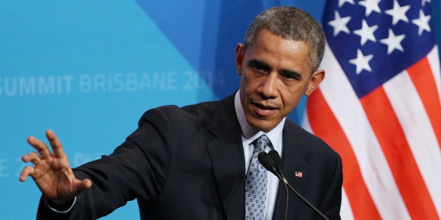 U.S. President Barak Obama gestures as he answers a question from the media during a press conference at the conclusion of the G-20 summit in Brisbane, Australia, Sunday, Nov. 16, 2014.(AP Photo/Rob Griffith)