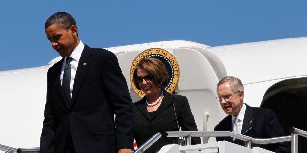President Barack Obama, followed by House Speaker Nancy Pelosi of Calif., and Senate Majority Leader Harry Reid of Nev., arrives at Yeager Airport in Charleston, W.Va., Friday, July 2, 2010, to attend a memorial service for the late Sen. Robert Byrd,. (AP Photo/Charles Dharapak)