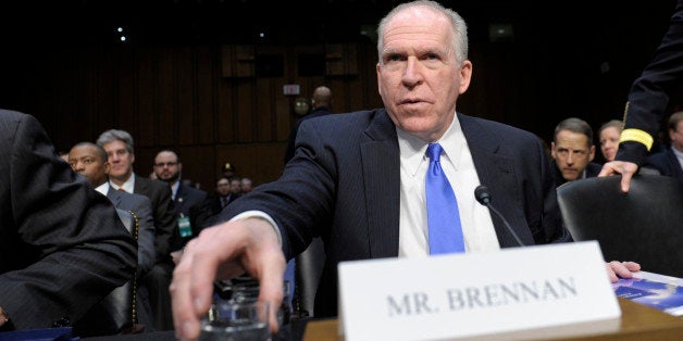 CIA Director John Brennan arrives on Capitol Hill in Washington, Tuesday, March 12, 2013, to testify before the Senate Intelligence Committee hearing on worldwide threats. (AP Photo/Susan Walsh)