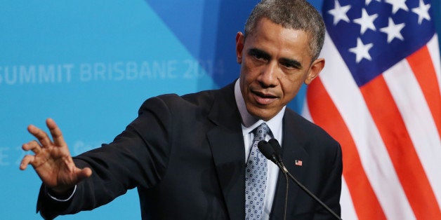 U.S. President Barak Obama gestures as he answers a question from the media during a press conference at the conclusion of the G-20 summit in Brisbane, Australia, Sunday, Nov. 16, 2014.(AP Photo/Rob Griffith)