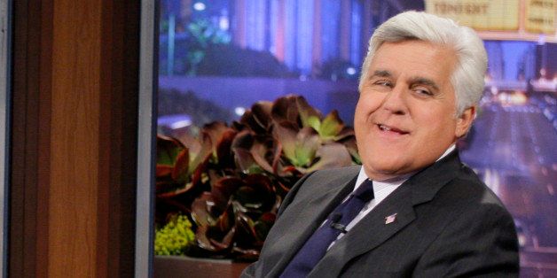 This Sept. 21, 2012 photo released by NBC shows Jay Leno, host of "The Tonight Show with Jay Leno," on the set in Burbank, Calif. As Jay Leno lobs potshots at ratings-challenged NBC in his "Tonight Show" monologues, speculation is swirling the network is taking steps to replace the host with Jimmy Fallon next year and move the show from Burbank to New York. NBC confirmed Wednesday, March 20, it's creating a new studio for Fallon in New York, where he hosts "Late Night." But the network did not comment on a report that the digs at its Rockefeller Plaza headquarters may become home to a transplanted, Fallon-hosted "Tonight Show." (AP Photo/NBC, Paul Drinkwater)