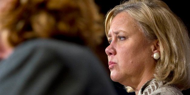 Senator Mary Landrieu, a Democrat from Louisiana, right, listens during a news conference at the U.S. Capitol in Washington, D.C., U.S., on Tuesday, Nov. 18, 2014. The U.S. Senate refused to approve TransCanada Corp.'s $8 billion Keystone XL pipeline after years of a political fight over jobs, climate change and energy security. Photographer: Andrew Harrer/Bloomberg via Getty Images 