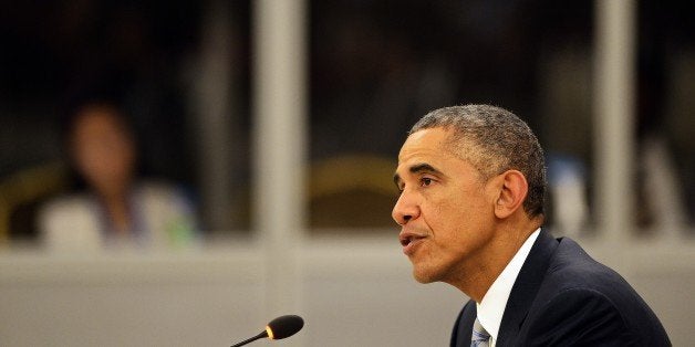 US President Barack Obama delivers a speech during the 2nd ASEAN-US Summit at the Myanmar International Convention Center in Myanmar's capital Naypyidaw on November 13, 2014. The Association of Southeast Asian Nations (ASEAN) and East Asia summits, held in the purpose-built capital of Naypyidaw this week, are the culmination of a year of diplomatic limelight for Myanmar after long decades shunted to the sidelines under its former military rulers. AFP PHOTO / Christophe ARCHAMBAULT (Photo credit should read CHRISTOPHE ARCHAMBAULT/AFP/Getty Images)