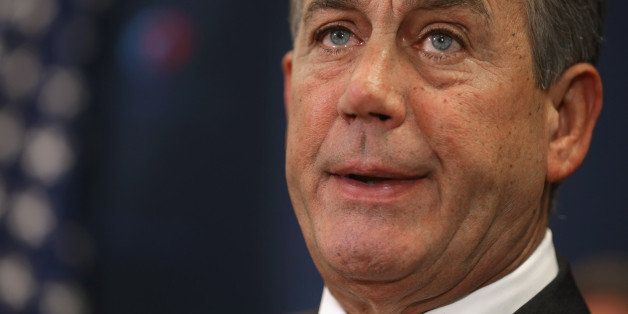 WASHINGTON, DC - NOVEMBER 18: Speaker of the House John Boehner (R-OH) talks to reporters after the weekly House Republican caucus meeting at the U.S. Capitol November 18, 2014 in Washington, DC. Boehner said that if U.S. President Barack Obama was to veto legislation authorizing the Keystone XL pipeline then he would be calling the American people 'stupid.' (Photo by Chip Somodevilla/Getty Images)