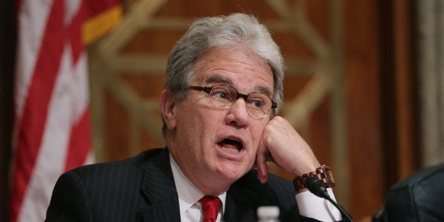 WASHINGTON, DC - SEPTEMBER 09: Sen. Tom Coburn (R-OK) questions witnesses about military equipment given to local law enforcement departments by the federal government during a Senate Homeland Security and Governmental Affairs Committee hearing about at the Dirksen Senate Office Building on Capitol Hill September 9, 2014 in Washington, DC. In the wake of the Ferguson, MO, police response to peaceful protests, senators on the committee were critical of the federal grant programs that allow local and state law enforcement agencies to buy armored vehicles, assult rifles, body armor and other military equipment. (Photo by Chip Somodevilla/Getty Images)