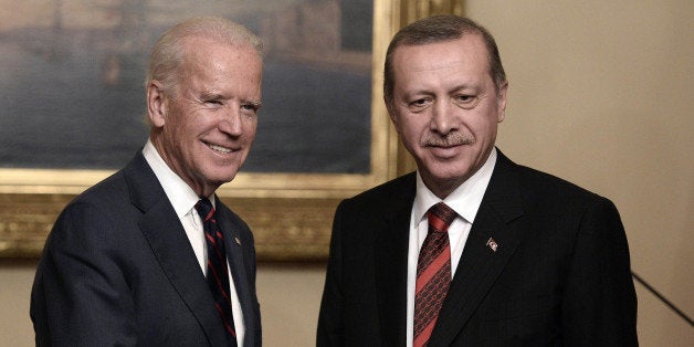 ISTANBUL, TURKEY - NOVEMBER 22: Turkey's President Recep Tayyip Erdogan (R) and U.S. Vice President Joe Biden (L) shake hand after a press conference following a meeting at the Beylerbeyi Palace on November 22, 2014 in Istanbul, Turkey. (Photo by Burak Akbulut/Anadolu Agency/Getty Images)