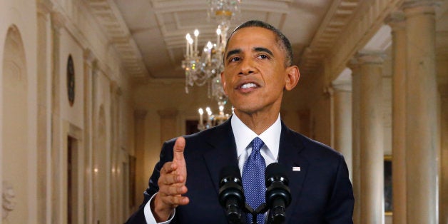 U.S. President Barack Obama speaks during a news conference in Washington, D.C., U.S., on Thursday, Nov. 20, 2014. Obama said hell defer deportations and open the chance of better jobs for about 5 million undocumented immigrants, ending months of build-up and initiating a showdown with congressional Republicans. Photographer: Jim Bourg/Pool via Bloomberg 