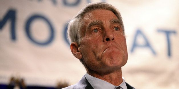 DENVER, CO - NOVEMBER 04: Senator Mark Udall holds back tears as he reacts to the crowd as he gives his concession speech at the Democrat Party at the Westin November 4, 2014 in Denver. (Photo by John Leyba/The Denver Post via Getty Images)