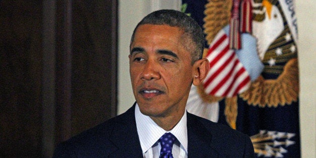 WASHINGTON, UNITED STATES - NOVEMBER 26: U.S. President Barack Obama is seen after he pardoned two turkeys named 'Mac' and 'Cheese' brought from Ohio state on the eve of Thanksgiving as a presidential tradition at White House in Washington, United States on November 26, 2014. (Photo by Kasim Ileri/Anadolu Agency/Getty Images)