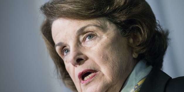 Senator Dianne Feinstein D-CA speaks to the media after a closed meeting of the Senate Intelligence Committee on Capitol Hill April 3, 2014 in Washington, DC. A damning Senate report concluded that the CIA misled Congress and the American public by downplaying the severity of its interrogations and overstating intelligence gleaned from the sessions, The Washington Post said April 1, 2014. Members of the committee met to vote today on whether to declassify the executive summary, key findings and a summary of the report. AFP PHOTO/Brendan SMIALOWSKI (Photo credit should read BRENDAN SMIALOWSKI/AFP/Getty Images)