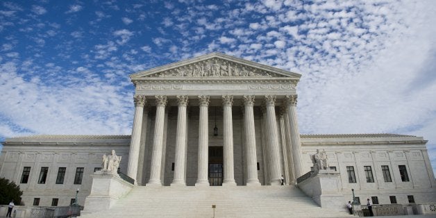 The US Supreme Court in Washington, DC, November 6, 2013. Earlier the Court heard oral arguments in the case of Town of Greece v. Galloway dealing with whether holding a prayer prior to the monthly public meetings in the New York town of Greece violates the Constitution by endorsing a single faith. AFP PHOTO / Saul LOEB (Photo credit should read SAUL LOEB/AFP/Getty Images)