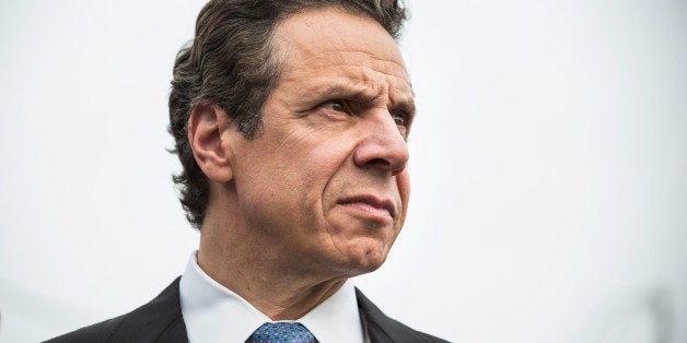 NEW YORK, NY - OCTOBER 29: New York Governor Andrew Cuomo attends a press conference about New York state's program to buy back homes destroyed by Hurricane Sandy and allow mother nature to reclaim the land, two years after Superstorm Sandy damaged the area, on October 29, 2014 in the Oakwood Beach neighborhood of the Staten Island Borough of New York City. Huricane Sandy was recorded as the deadliest and most destructive hurricane of the 2012 Atlantic hurricane season. It caused over $68 billion in damages, and hundreds of people were killed along the path of the storm in seven countries. Today marks the two-year anniversary of its storm surge hitting New York City and the surrounding area which flooded streets, tunnels and subway lines and cut power in and around the city. (Photo by Andrew Burton/Getty Images)