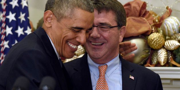President Barack Obama shares a laugh with Ashton Carter, his nominee for defense secretary, Friday, Dec. 5, 2014, during the announcement in the Roosevelt Room of the White House in Washington. (AP Photo/Susan Walsh)