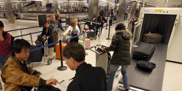 LOS ANGELES, CA - DECEMBER 10: International air travelers have their baggage x-rayed in the secondary agriculture inspectio